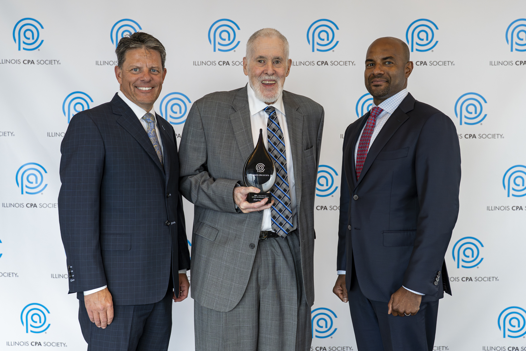 Joseph F. Bigane III, CPA, receiving his Lifetime Achievement Award with ICPAS Chairperson Brian Blaha (L) and ICPAS President and CEO Geof Brown (R).